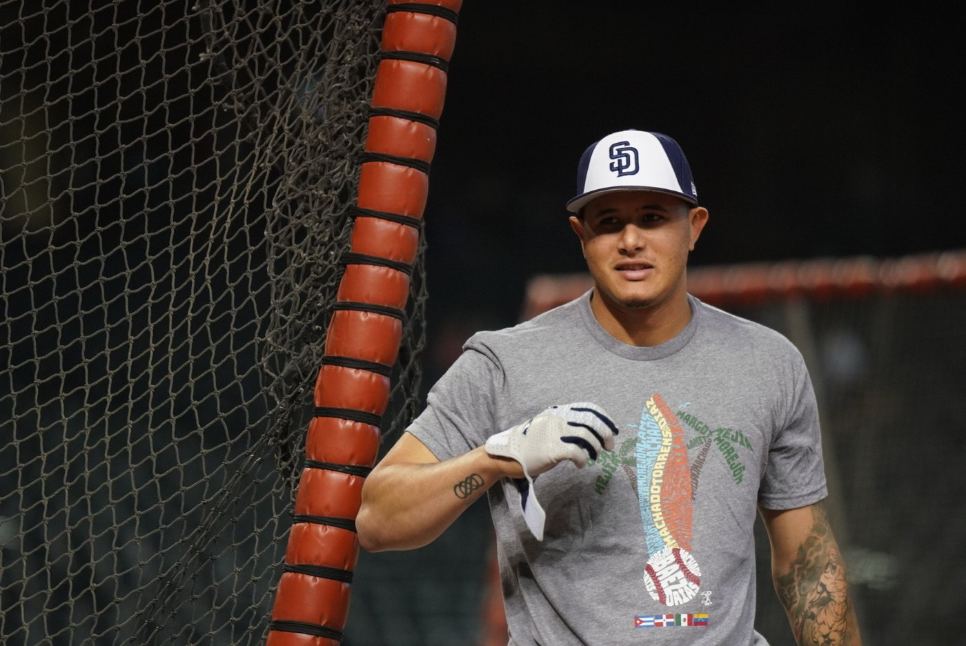 Manny Machado wearing the San Diego Hispanic Heritage Month design in the batting cage